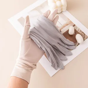 Detail view of lightweight mulberry silk sun protection gloves for summer driving