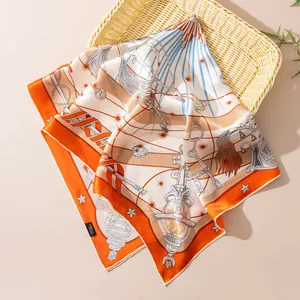 Detailed view of a luxurious mulberry silk square scarf with vintage illustrations.
