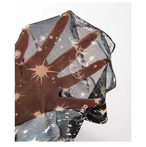 Detail view of mulberry silk mesh scarf with celestial star and moon digital print
