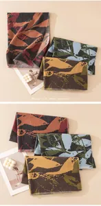 Detail of patterned wool blend scarves with artistic abstract prints
