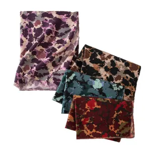 Vintage long printed shawls with abstract patterns in multiple colors on white background