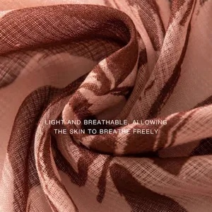 Elegant vintage floral print scarf made of lightweight, breathable fabric shown in detail.