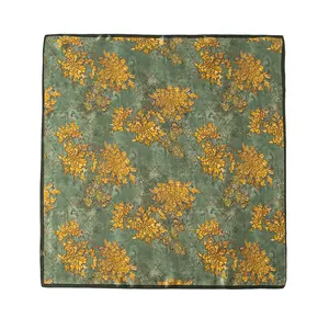 Elegant green mulberry silk square scarf featuring a luxury golden sunflower print