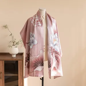 Close-up detail of a pink New Chinese style silk shawl with elegant lotus floral patterns