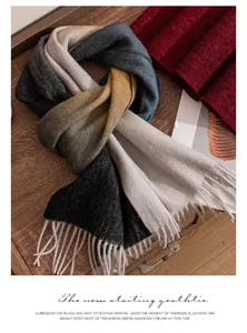 Soft wool scarf featuring water ripple gradient design and stylish fringe tassels