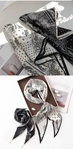 Detailed view of elegant mulberry silk scarves with classic paisley bandana patterns