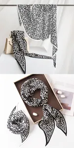 Detail of elegant leopard print mulberry silk scarf with clean edges and smooth texture.
