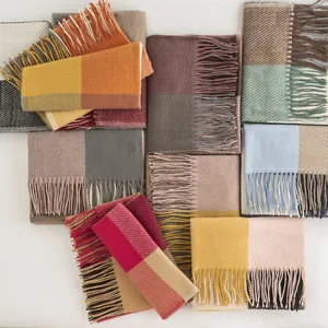 Assorted plaid tassel scarves in various colors and styles for modern women's fashion outfits