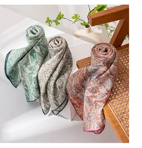 Luxurious silk-wool blend scarves with elegant vintage Toile de Jouy patterns in three colors.