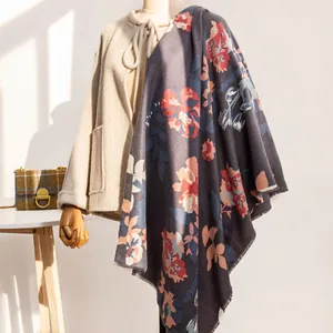 Close-up detail of a vintage floral print shawl in soft imitation cashmere fabric
