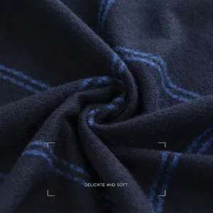Elegant men's navy blue plaid scarf featuring a soft texture and classic checkered design
