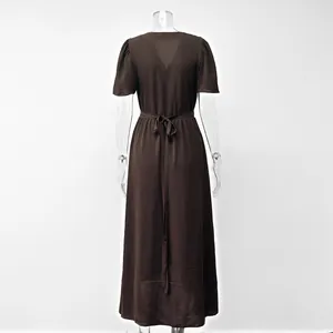 Back view of elegant brown short-sleeved long dress with a functional adjustable waist tie