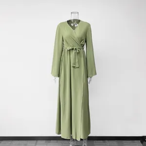 Elegant sage green wrap maxi dress with long sleeves and waist tie for autumn.