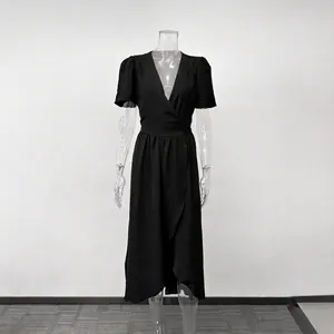 Front view of an elegant black short-sleeved wrap midi dress for summer