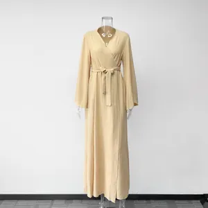 Elegant beige long sleeve maxi wrap dress can be worn as a stylish autumn cardigan
