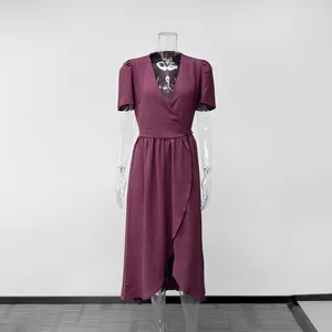Front view of an elegant purple V-neck short sleeve wrap maxi dress on a mannequin