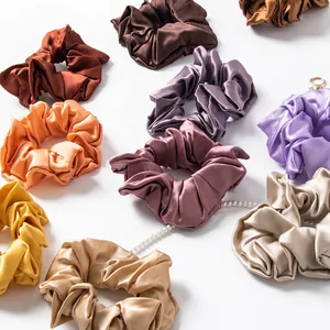 Premium large silk scrunchies in elegant assorted colors with a soft luxury satin finish