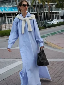French style long blue shirt dress with front buttons and side split for beach vacation