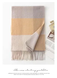 Elegant thick plaid cashmere scarf in yellow and grey tones featuring soft tassels