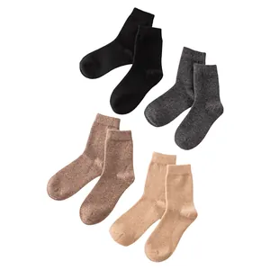 Unisex 100% cashmere warm winter crew socks in black, grey, brown, and tan solid colors.