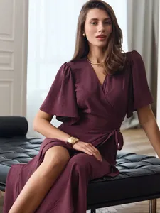 Elegant deep purple wrap maxi dress with a flattering V-neck and stylish flutter sleeves