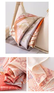 Close-up macro detail of double-sided printed mulberry silk scarf with floral patterns