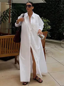 Elegant French style white long sleeve maxi shirt dress with front slit for resort wear