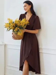 Elegant dark brown short-sleeved wrap dress featuring an asymmetrical high-low hemline.