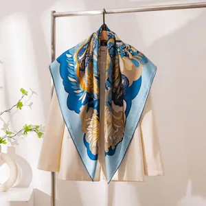 Premium large mulberry silk scarf with blue floral print and handmade rolled edges