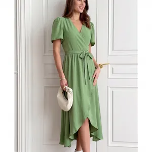 Elegant sage green short-sleeved wrap maxi dress with waist belt and high-low hem