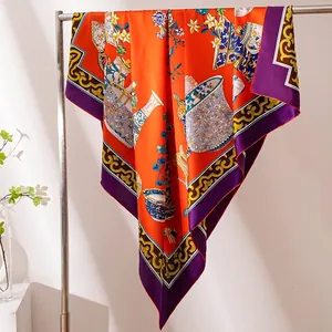 Elegant orange mulberry silk square scarf with purple border and classical floral print