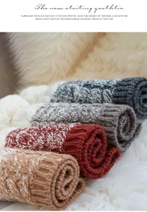 Detailed view of 100% sheep wool cable-knit beanies in multiple autumn colors