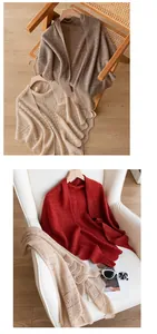 Close-up view of lightweight hollow knitted pure cashmere shawl in multiple colors