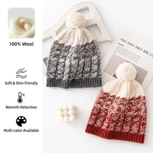 100% wool knitted beanie hat with cozy pom-pom and thick cable stitch for winter.