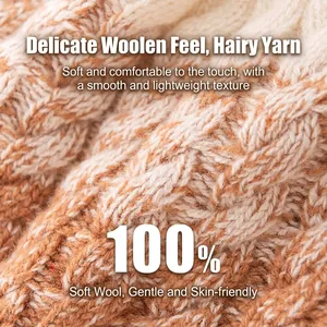 Detail of camel 100% sheep wool knitted beanie showing cable knit pattern texture
