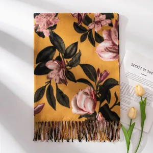 Elegant yellow floral cashmere-like scarf with soft tassels and pink blooms