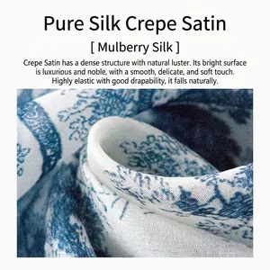High-quality mulberry silk crepe satin shawl with artistic blue floral pattern detail