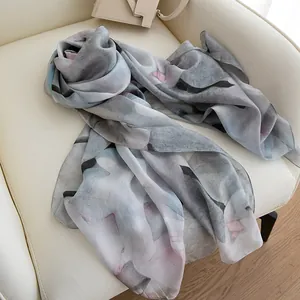 Elegant 100% mulberry silk scarf for women with artistic ink-wash magnolia flower print