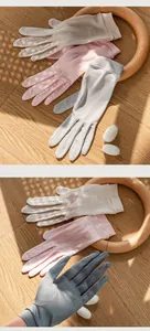 Soft mulberry silk sun protection gloves for women shown in multiple pastel colors.