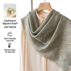 Premium sage green paisley cashmere square scarf 100x100cm draped on a wooden hanger
