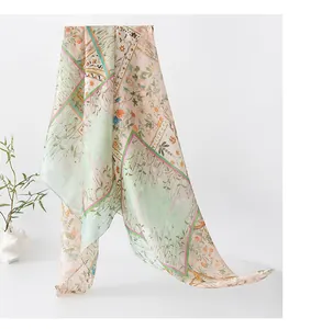 Detailed texture of lightweight mulberry silk scarf with elegant floral patterns