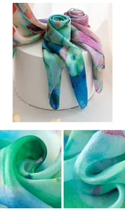 Macro view of vintage oil painting style silk scarf showing luxury texture