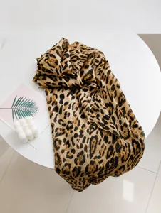 Premium 100% mulberry silk scarf with classic leopard print pattern detail view