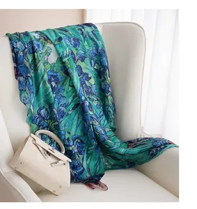 Detail of blue and green iris flower print on lightweight silk scarf