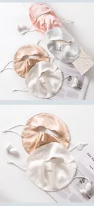 Detailed view showing texture and color variety of mulberry silk sun protection face masks.