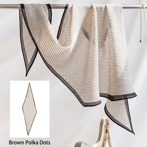 Elegante sciarpa in misto seta e lana a pois con bordo marrone a forma di rombo lungo