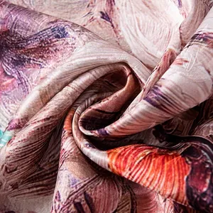 Close-up of elegant mulberry silk scarf with artistic print texture and soft luster