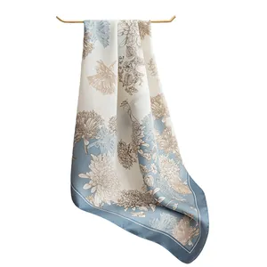 Elegant floral printed square silk-like scarf in light blue and cream colors for women