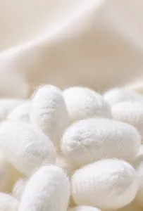 Detail view of silk cocoons showing 18% silk and 82% wool material composition