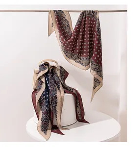 Detailed view of luxury silk wool scarf with vintage retro pattern and elegant draping